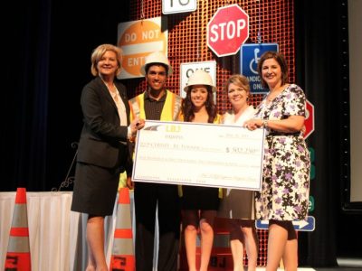 Presenting the Grant to R. L. Turner High School