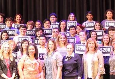 LBJ Express and NMSI leaders join R.L. Turner students and educators to celebrate AP test results. Students received $100 for each AP test they passed.