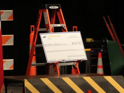 NTE project team's $476,750 grant check on display