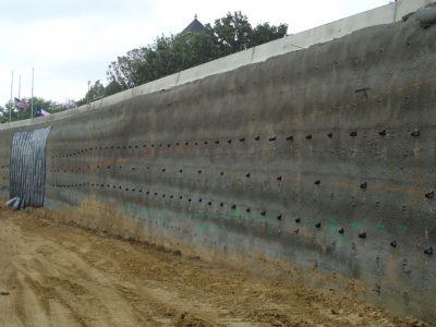 April 2013: Retaining wall along westbound frontage road between Murphy Drive and Central Drive