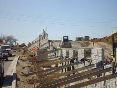 February 2013: Retaining walls along eastbound frontage road west of Precinct Line Road