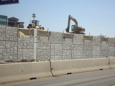 February 2013: Retaining walls along eastbound frontage road of SH 121/183 between Bedford Road and Forest Ridge Drive