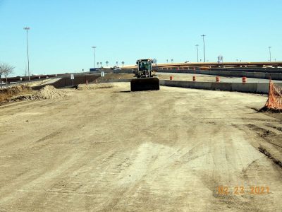 Work on the future westbound I-820 frontage road at Mark IV Pkwy.