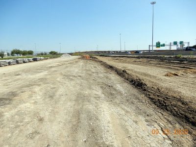 Work on the future westbound I-820 frontage road at Mark IV Pkwy.