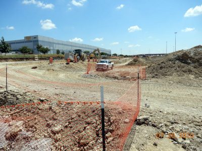Work on the future westbound I-820 frontage road at Mark IV Pkwy.
