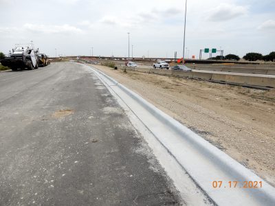 Work on the future westbound I-820 frontage road at Mark IV Pkwy. 