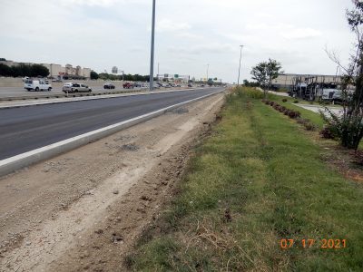 Work on the future southbound I-35W frontage road south of Western Center Blvd.