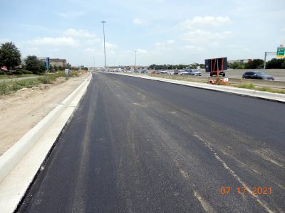 Work on the future southbound I-35W frontage road south of Western Center Blvd.
