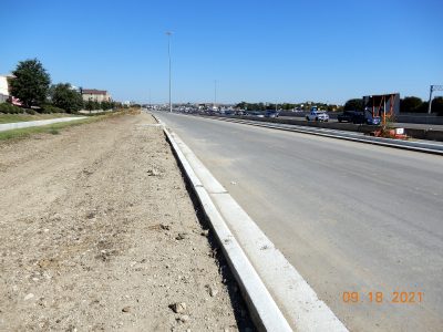 Work on the future southbound I-35W frontage road south of Western Center Blvd.