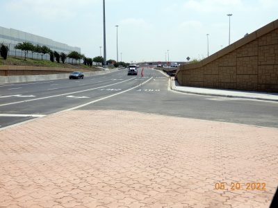 Work on the new westbound I-820 frontage road at Mark IV Pkwy. 
