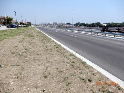 Work on the new southbound I-35W frontage road south of Western Center Blvd.