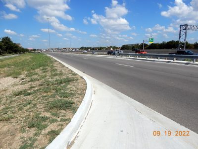The new frontage road connecting Western Center Blvd. to Mark IV Pkwy.