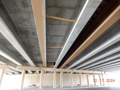 work on Holiday Ln. at I-820