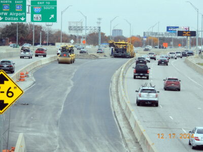 work on I-820 between Rufe Snow Dr. and Holiday Ln.